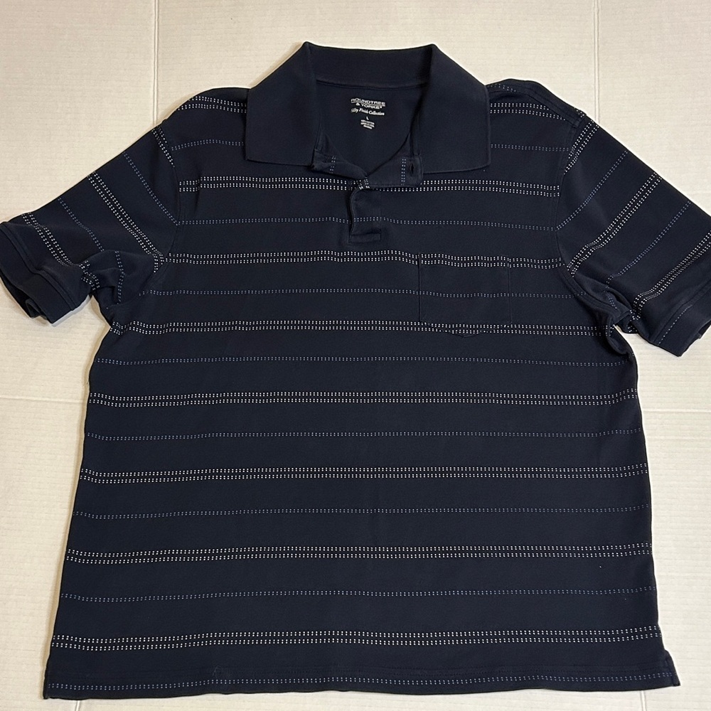 Roundtree & Yorke Sz Large Navy Polo with Light Stripes and front pocket.